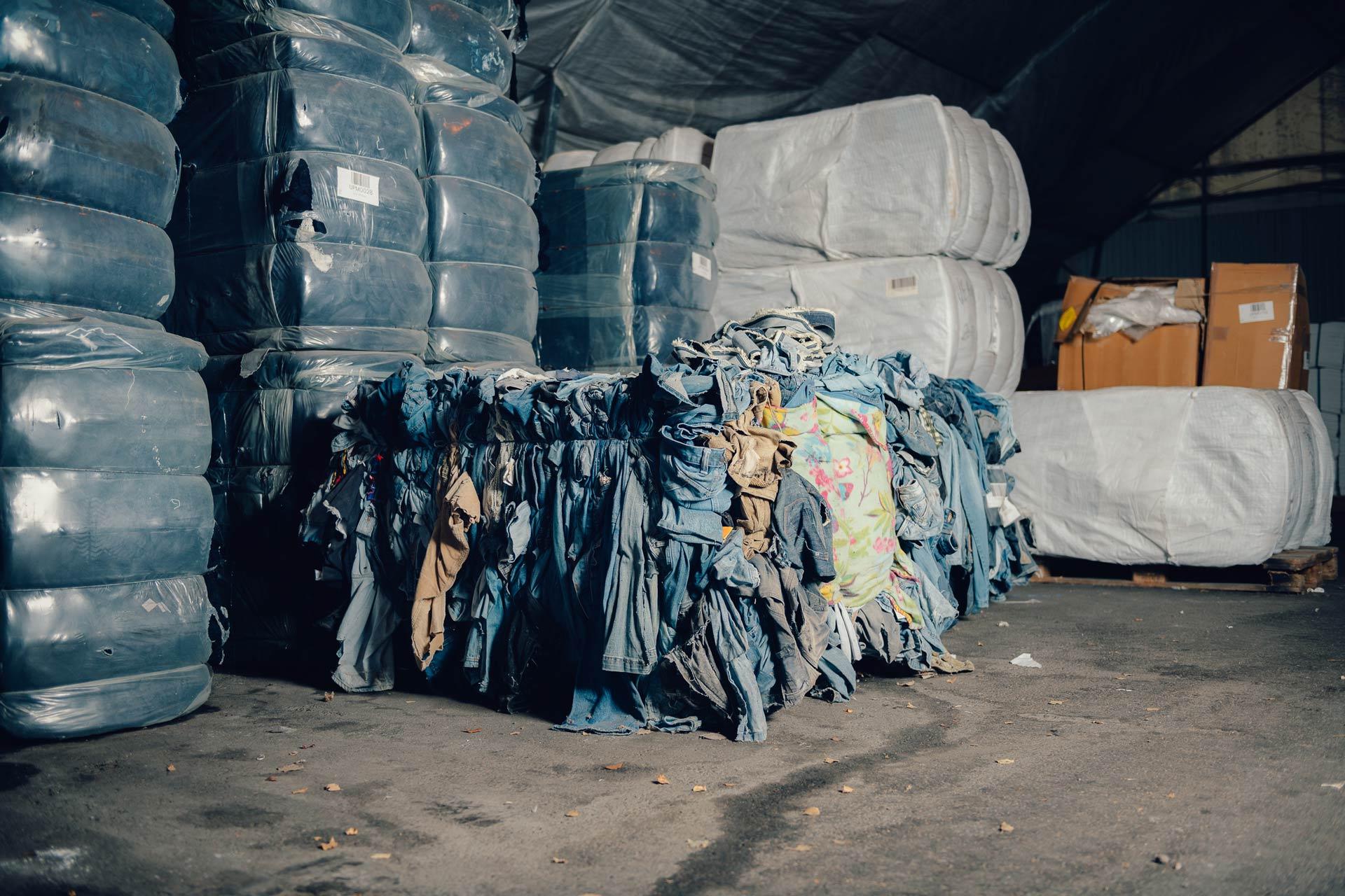 A bale of discarded jeans garments, ready to be recycled as circulose.